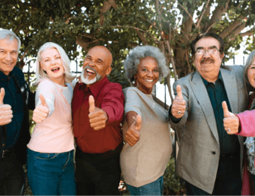 Group of people with thumbs up